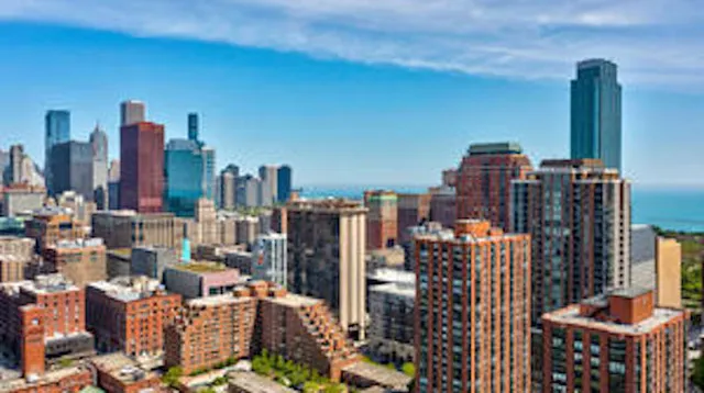 a city street filled with lots of tall buildings