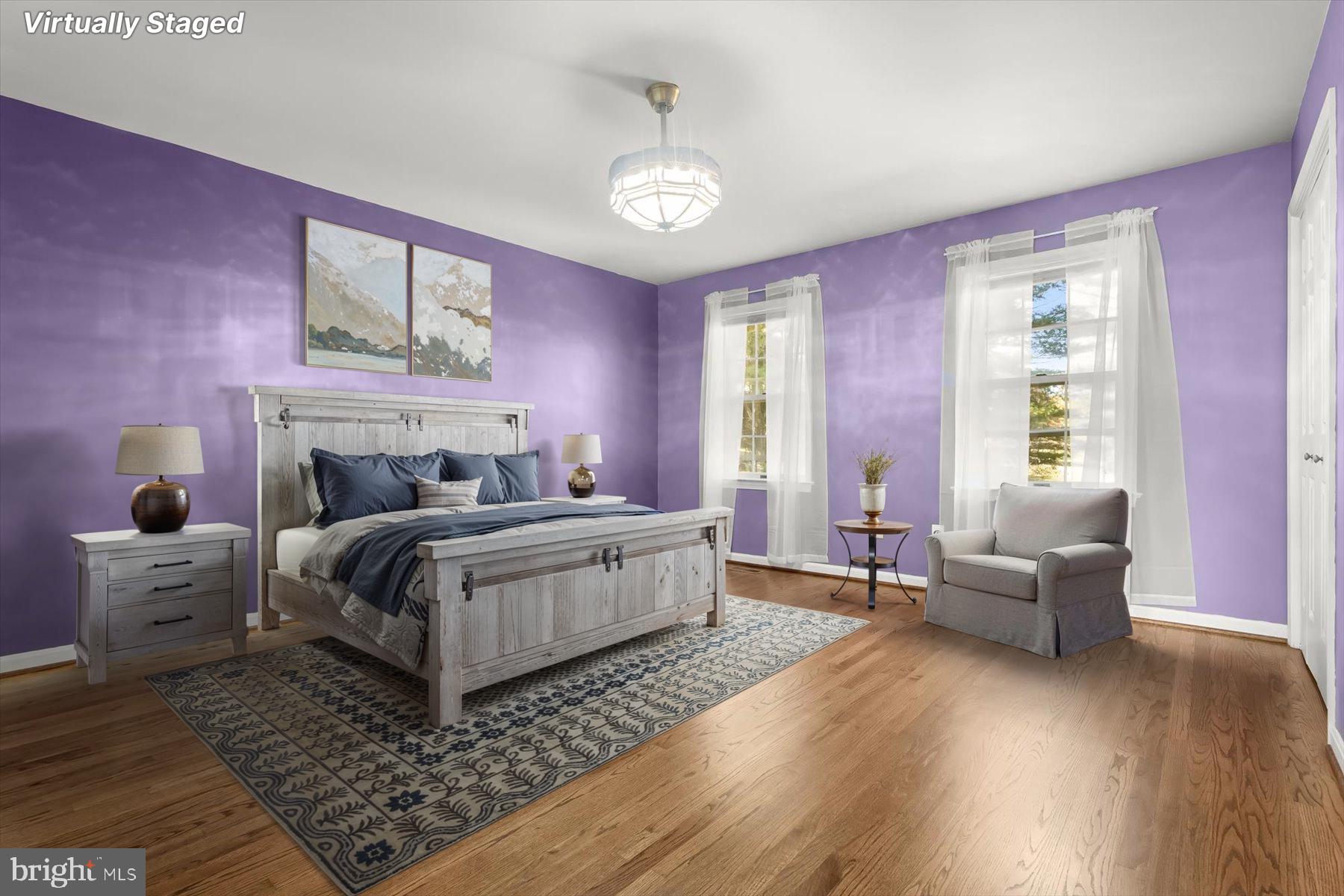 9600 Watkins Road Gaithersburg, MD 20882 - Photo 31 of 47 a spacious bedroom with a bed and a couch