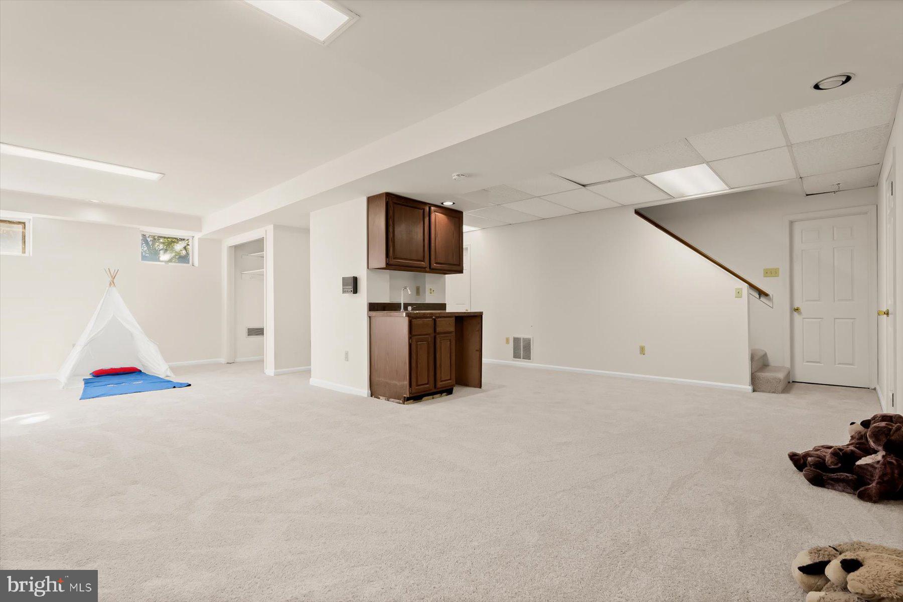 9600 Watkins Road Gaithersburg, MD 20882 - Photo 35 of 47 a view of kitchen with furniture and flat screen tv