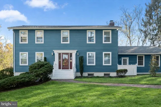 a brick house with a yard