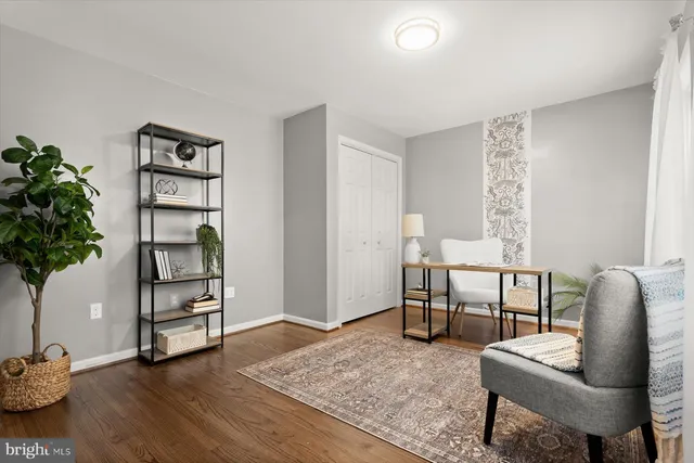 a workspace with furniture and window