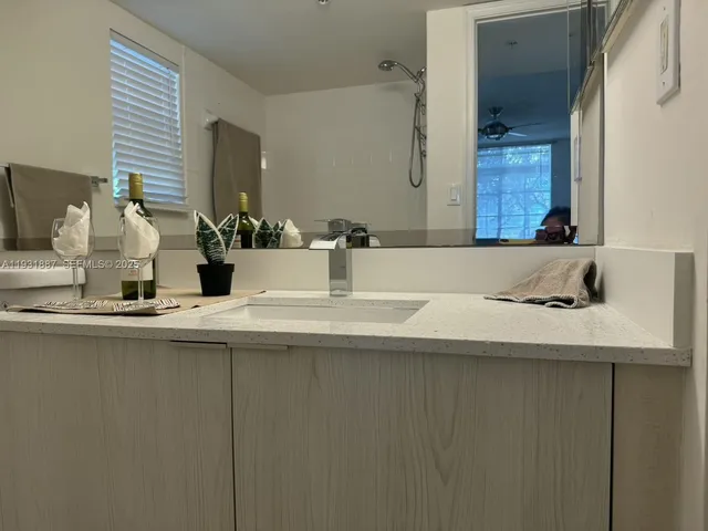 a view of a street with houses on both side of it