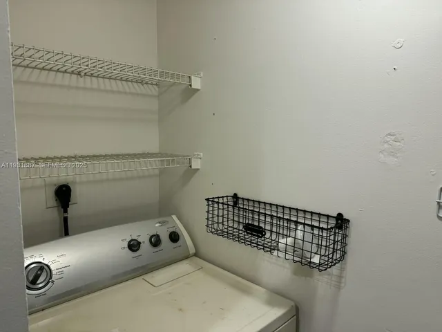 a view of a lake with a garden and trees