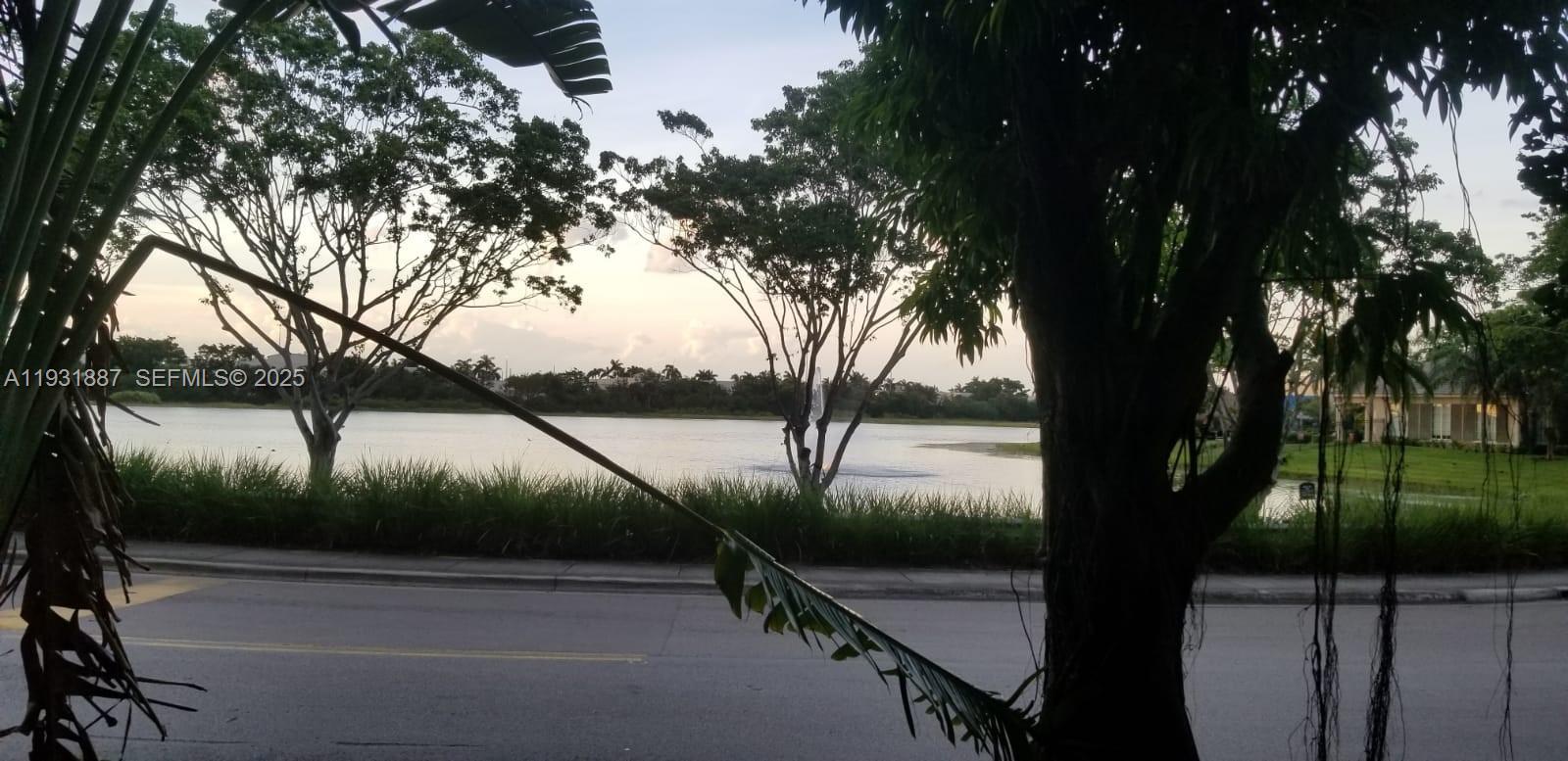 11145 Southwest 6th Street, Unit 104 Pembroke Pines, FL 33025 - Photo 29 of 37 a view of swimming pool from a lake view