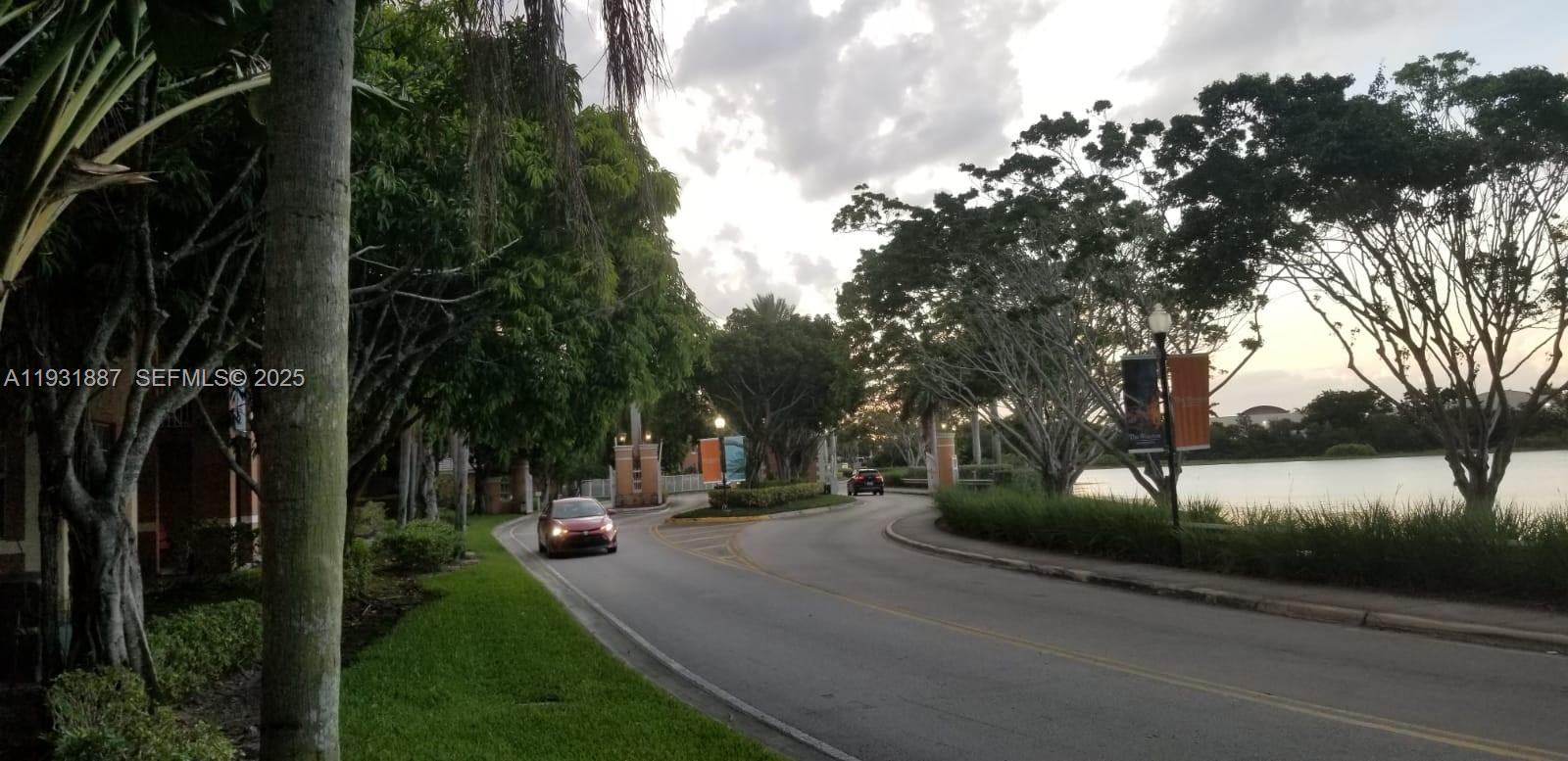 11145 Southwest 6th Street, Unit 104 Pembroke Pines, FL 33025 - Photo 31 of 37 a view of a street with houses on both side of it