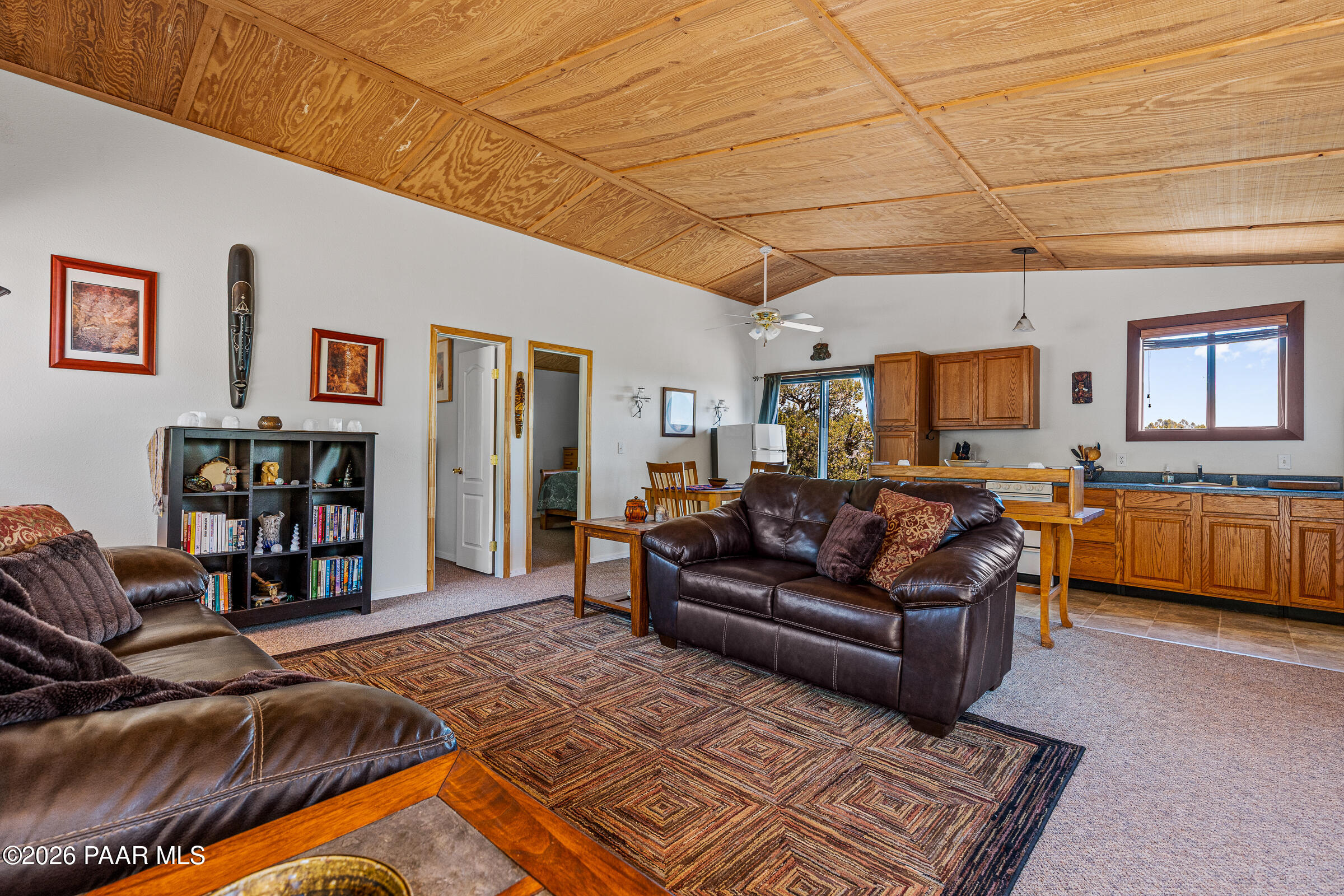 33749 West Whiskey River Road, Unit 21 Seligman, AZ 86337 - Photo 10 of 41 a living room with furniture and a couch