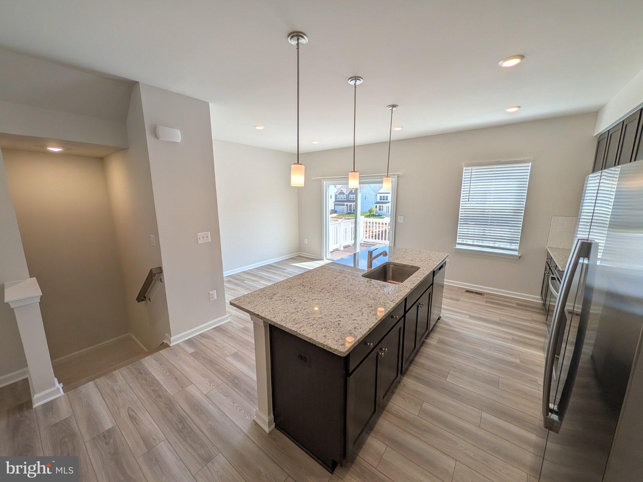 278 Swan Fld Avenue Ranson, WV 25438 - Photo 12 of 33 Modern kitchen with natural light.