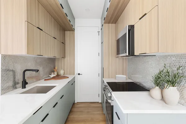 a kitchen with a sink and cabinets
