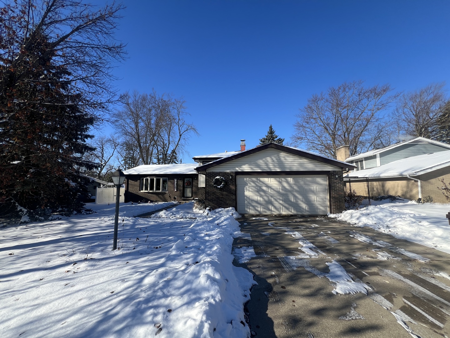 620 Willow Street Frankfort, IL 60423 - Photo 1 of 32 a view of a house with wooden fence