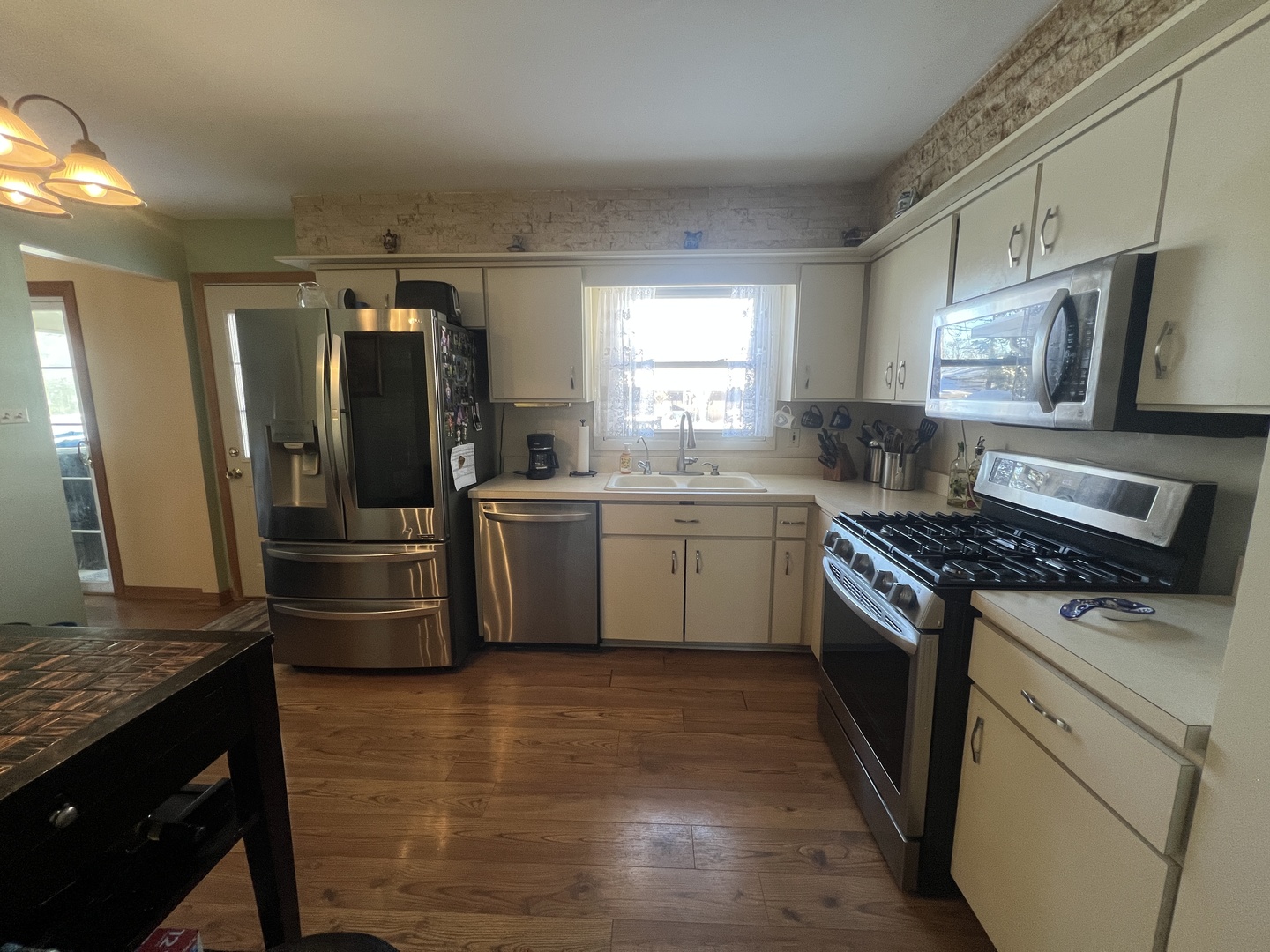 620 Willow Street Frankfort, IL 60423 - Photo 10 of 32 a kitchen with stainless steel appliances granite countertop a stove a sink dishwasher a refrigerator and a oven