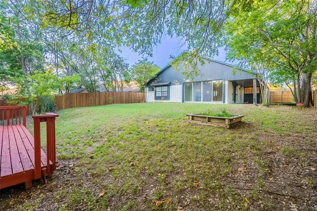 a house view with a garden space
