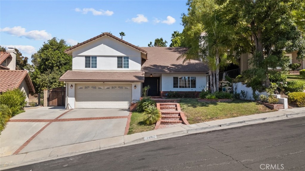 17407 Sunset Ridge Circle Granada Hills, CA 91344 - Photo 1 of 1 front view of house with a yard