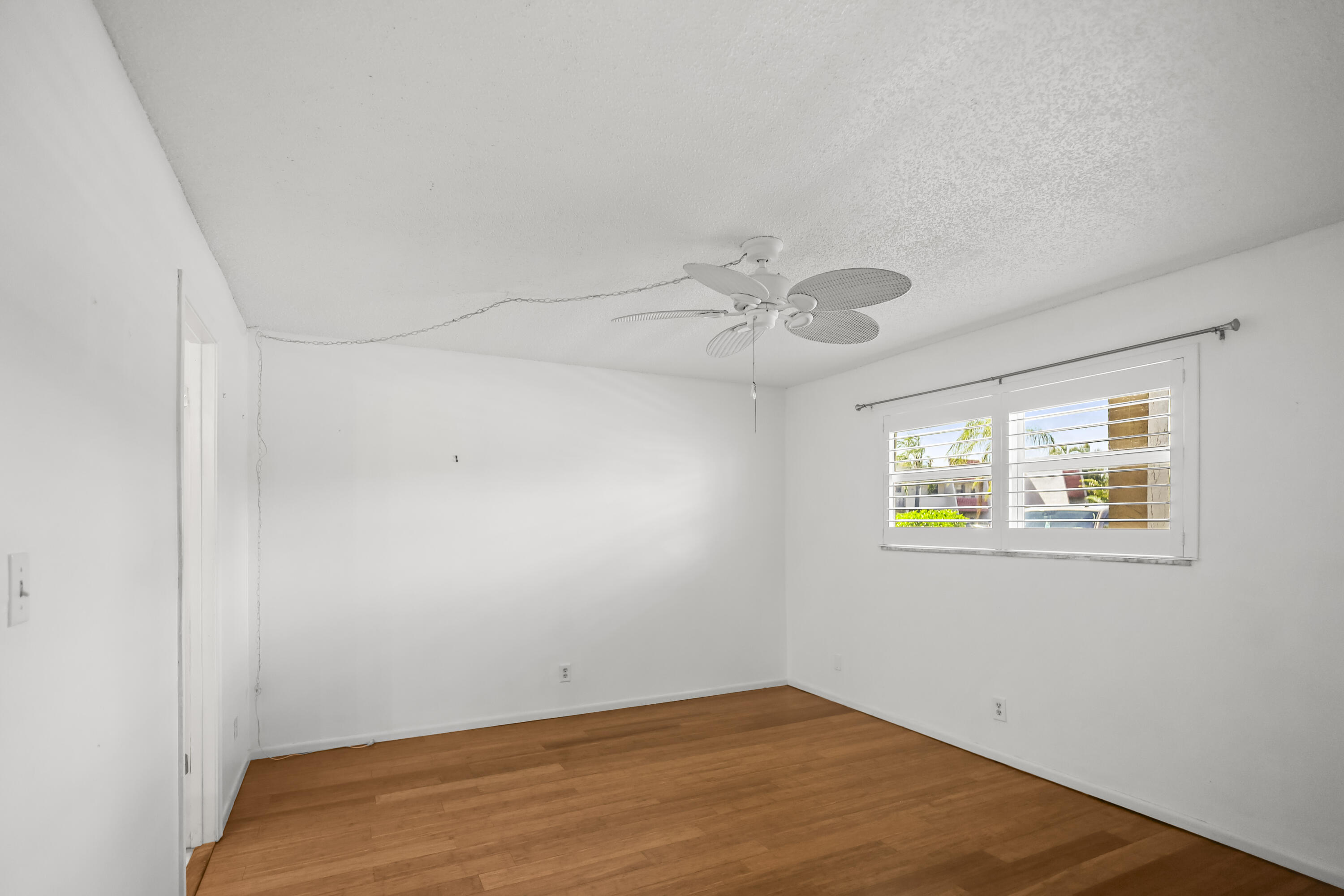 2500 Fiore Way, Unit 103 Delray Beach, FL 33445 - Photo 7 of 19 a view of an empty room