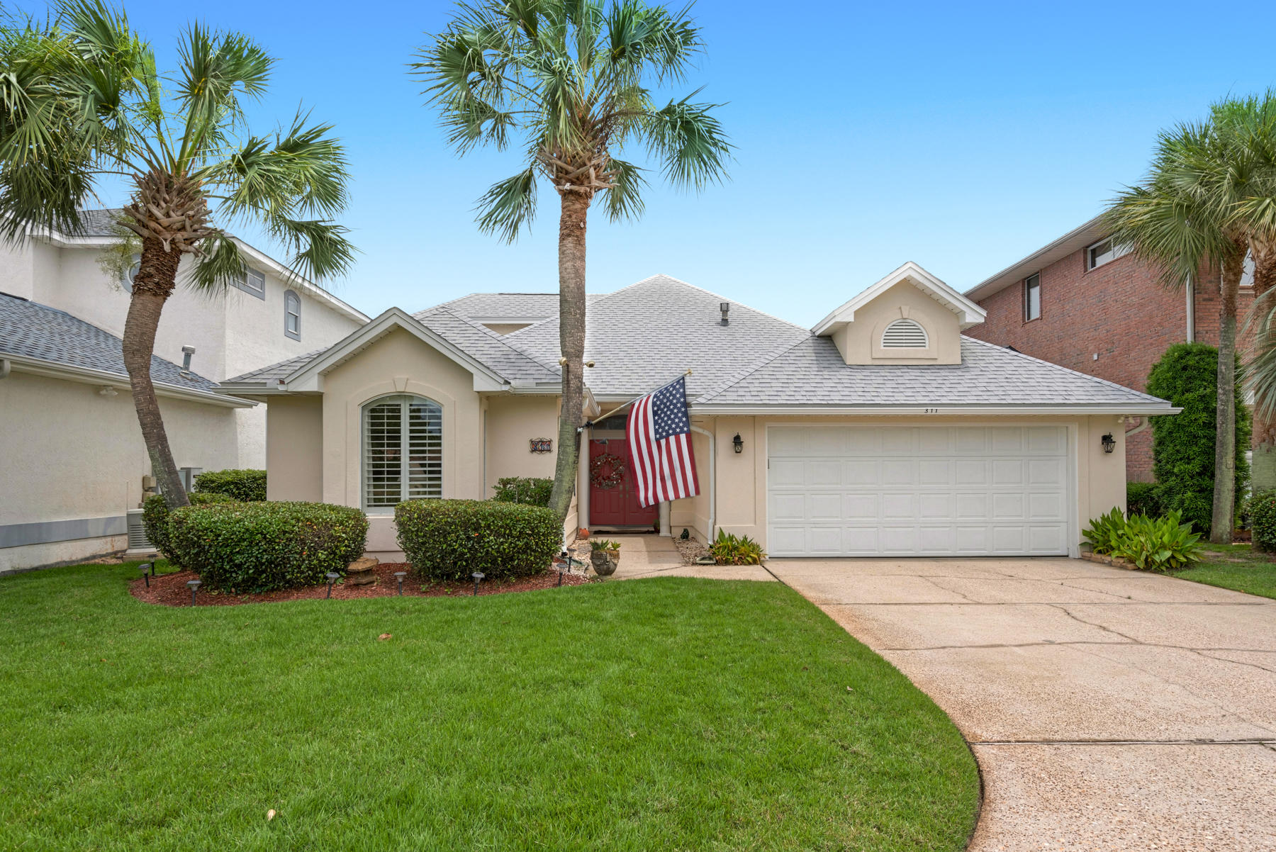 311 Country Club Road Shalimar, FL 32579 - Photo 16 of 73 a front view of house with yard and green space