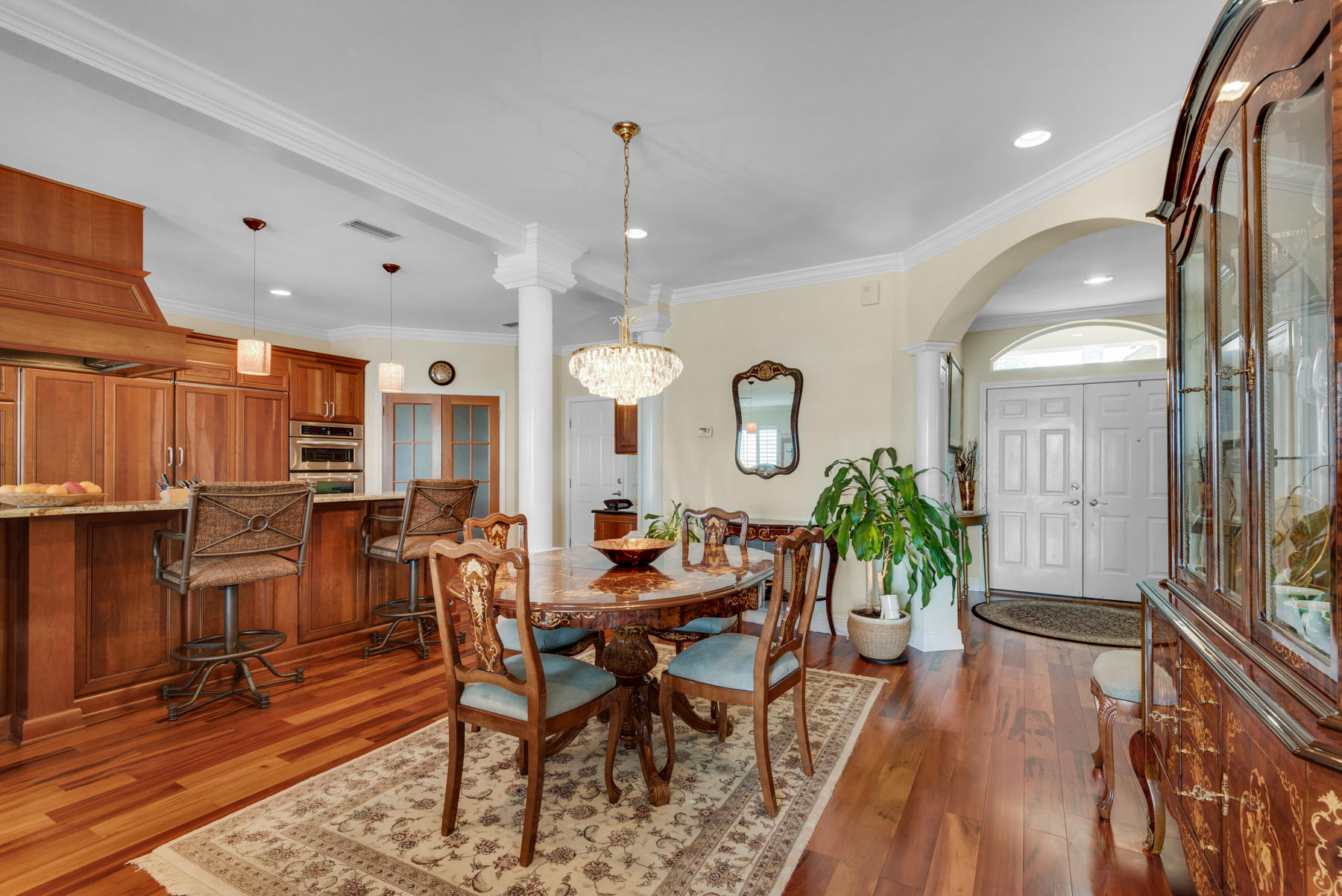 311 Country Club Road Shalimar, FL 32579 - Photo 24 of 73 a view of a dining room with furniture window and wooden floor