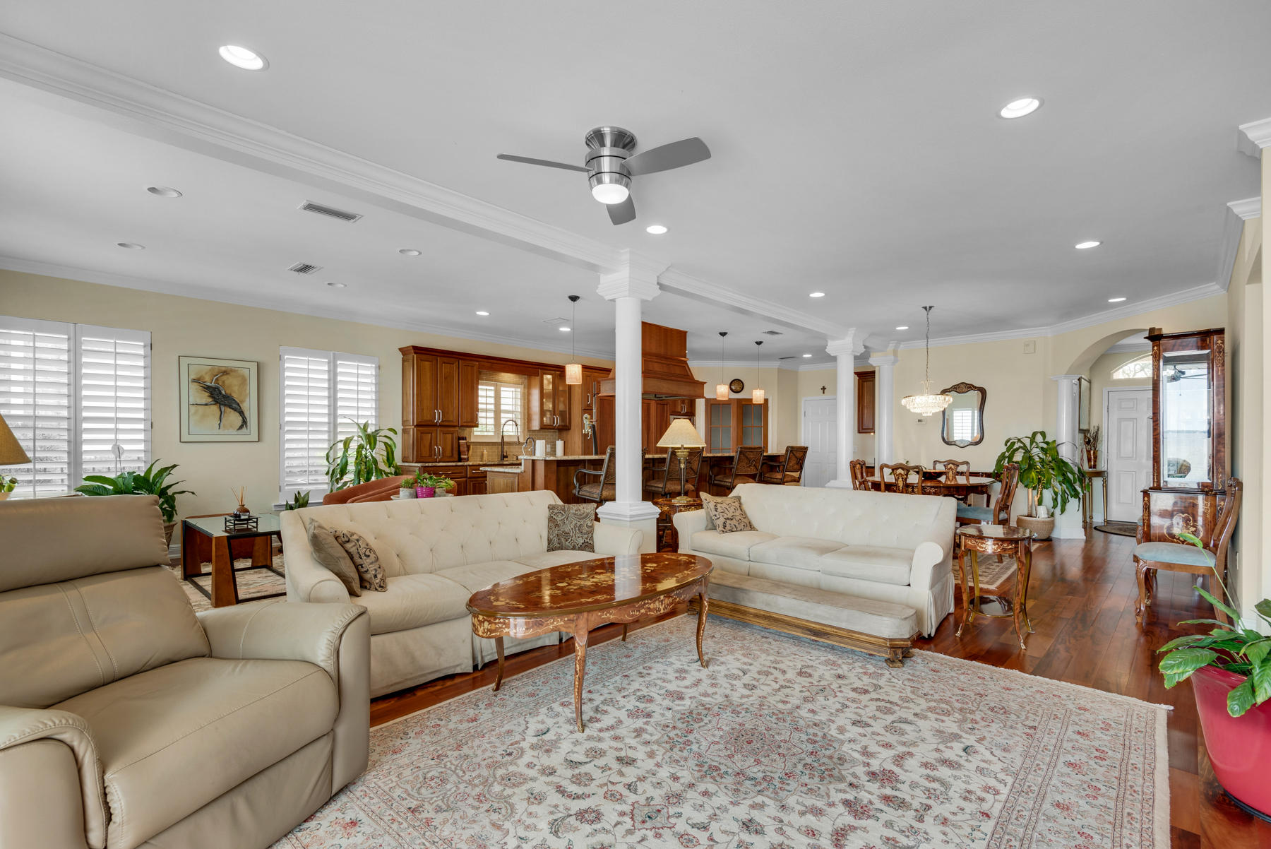 311 Country Club Road Shalimar, FL 32579 - Photo 25 of 73 a living room with furniture potted plant and a ceiling fan