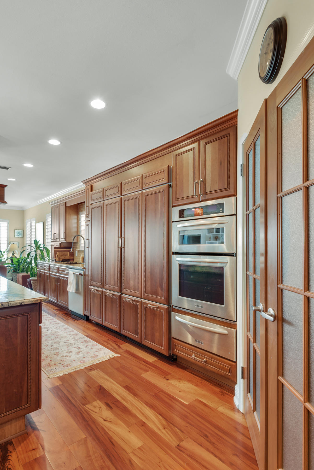 311 Country Club Road Shalimar, FL 32579 - Photo 35 of 73 a kitchen with stainless steel appliances granite countertop a refrigerator and a stove