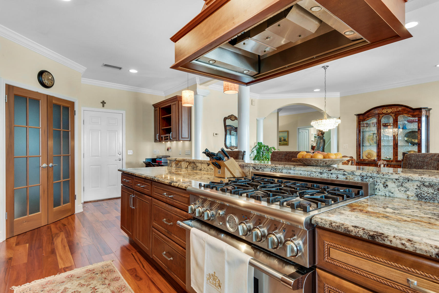 311 Country Club Road Shalimar, FL 32579 - Photo 37 of 73 a kitchen with stainless steel appliances granite countertop a stove and a sink