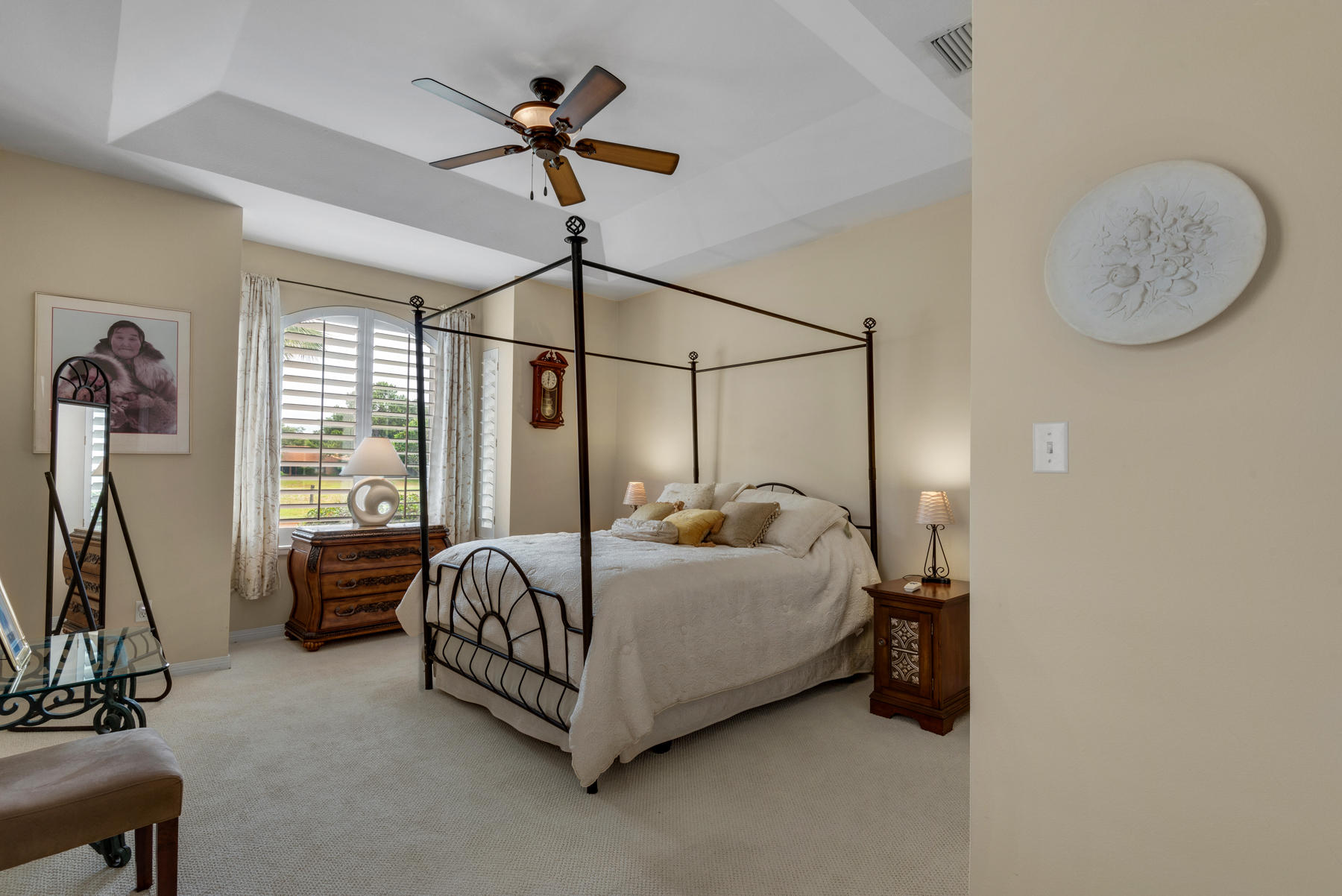 311 Country Club Road Shalimar, FL 32579 - Photo 41 of 73 a bed room with a bed and a chandelier