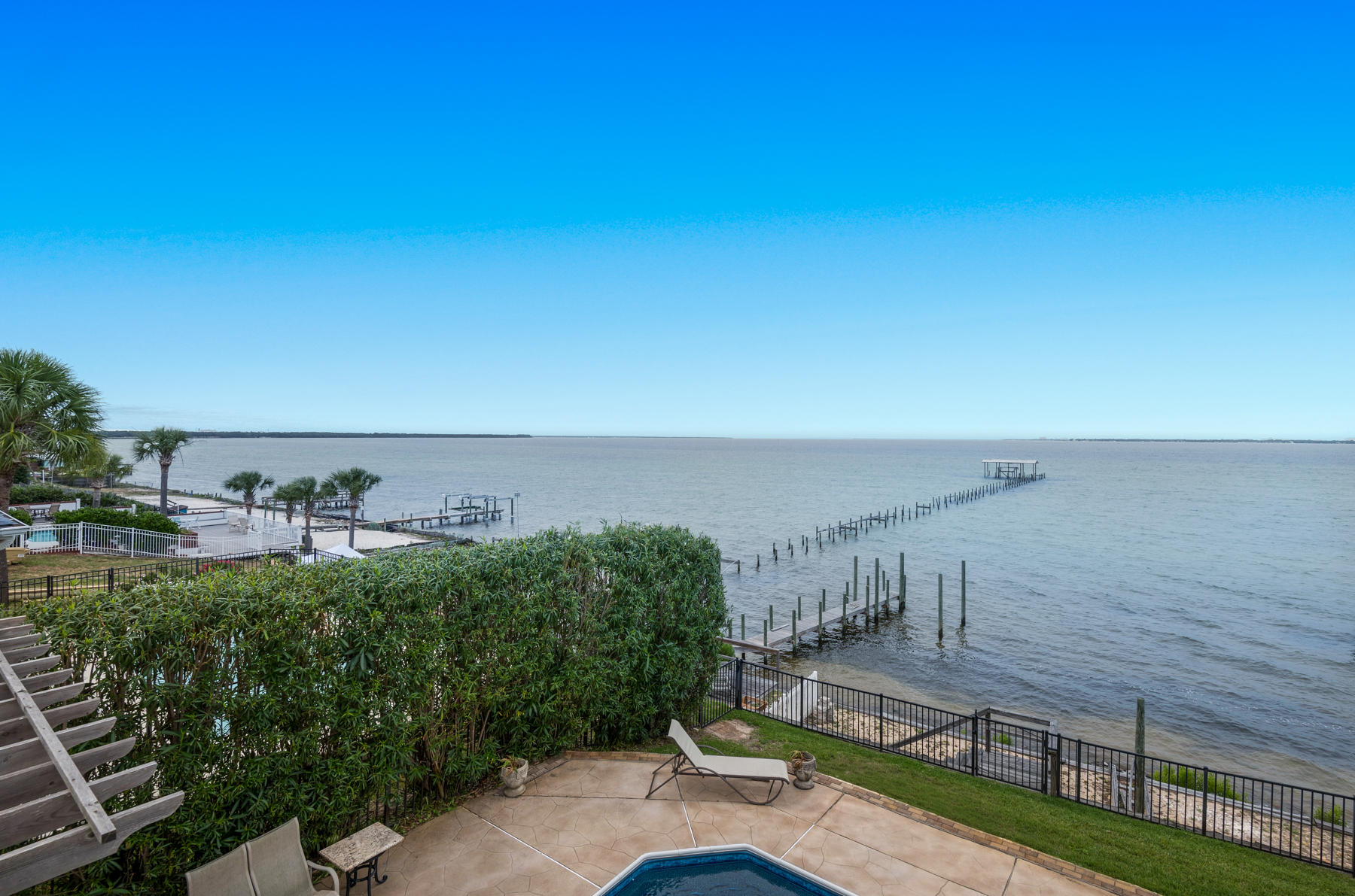 311 Country Club Road Shalimar, FL 32579 - Photo 53 of 73 a view of a terrace with a bench