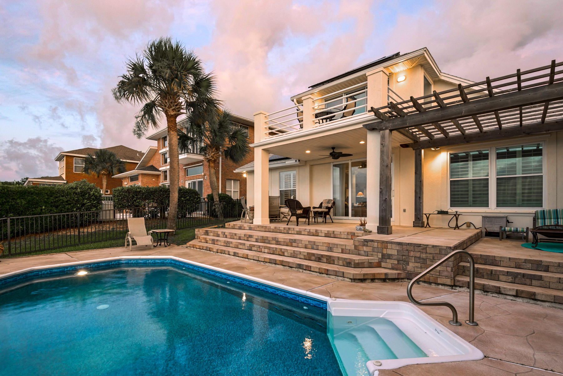 311 Country Club Road Shalimar, FL 32579 - Photo 8 of 73 a view of a house with swimming pool and sitting area