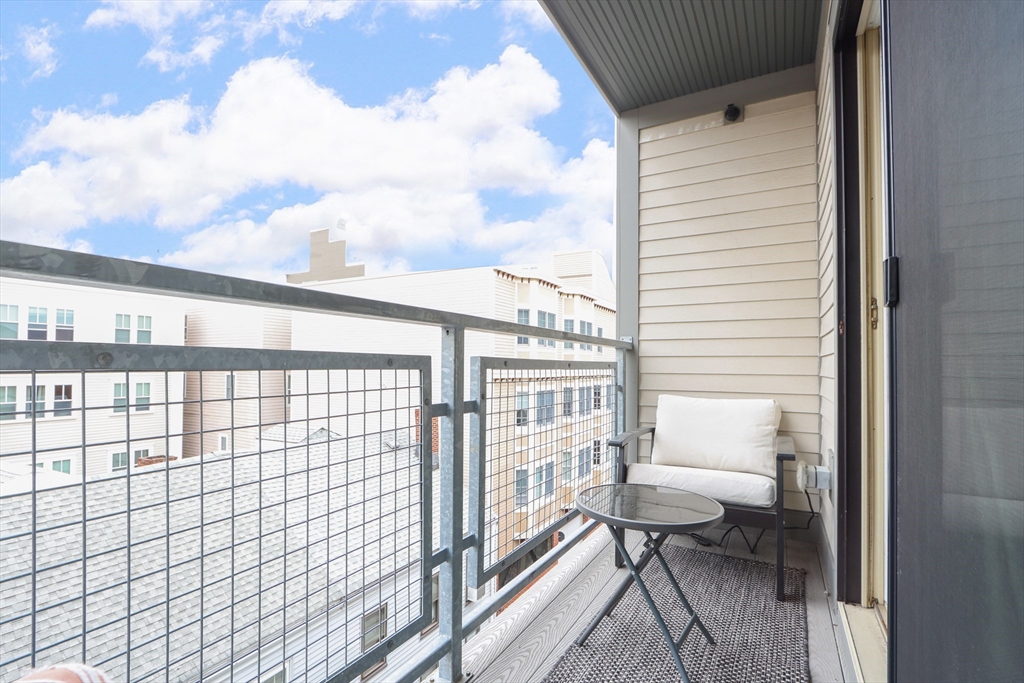 309 E Street, Unit 45 Boston, MA 02127 - Photo 20 of 33 a view of a balcony with chairs