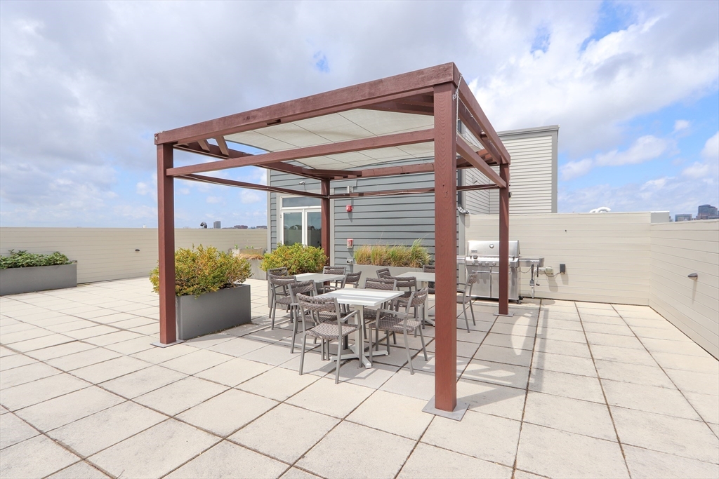 309 E Street, Unit 45 Boston, MA 02127 - Photo 23 of 33 a view of an outdoor space with lounge chair