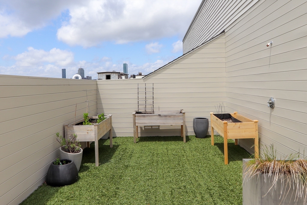 309 E Street, Unit 45 Boston, MA 02127 - Photo 25 of 33 a view of a patio in backyard