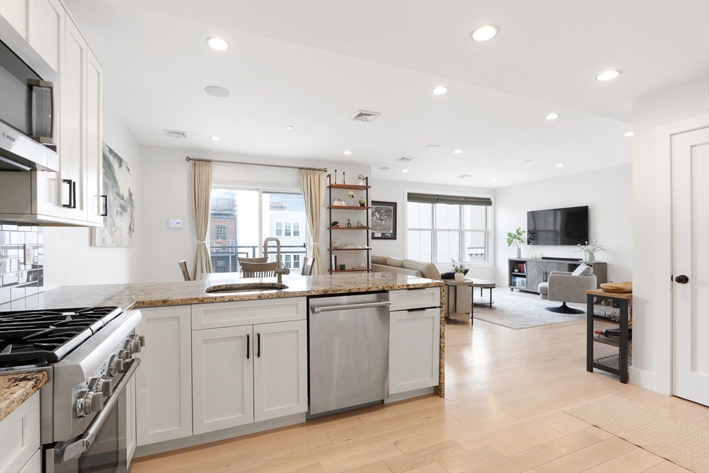 309 E Street, Unit 45 Boston, MA 02127 - Photo 7 of 33 a kitchen with lots of counter top space and appliances