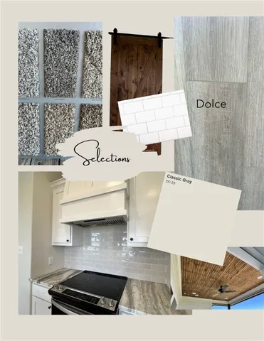 a view of kitchen with stainless steel appliances cabinets