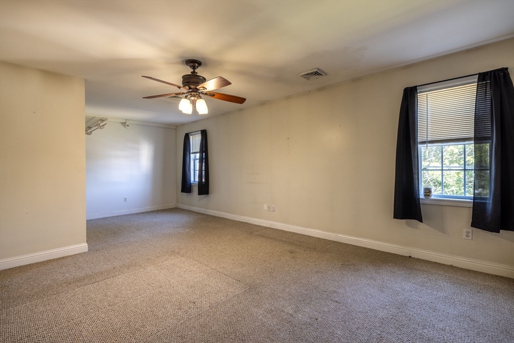 1556 North Main Street, Unit 10 Fall River, MA 02720 - Photo 16 of 30 a view of an empty room with a window