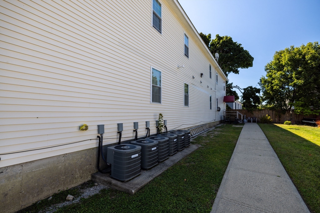 1556 North Main Street, Unit 10 Fall River, MA 02720 - Photo 27 of 30 a view of a back yard of the house