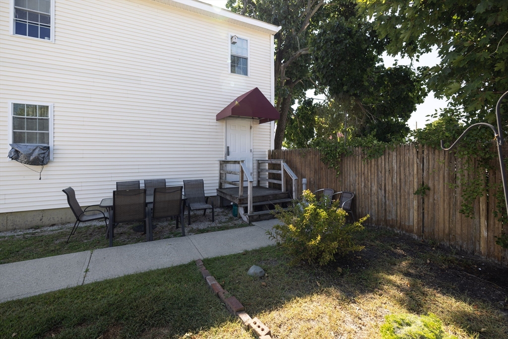 1556 North Main Street, Unit 10 Fall River, MA 02720 - Photo 29 of 30 a view of a house with backyard and sitting area