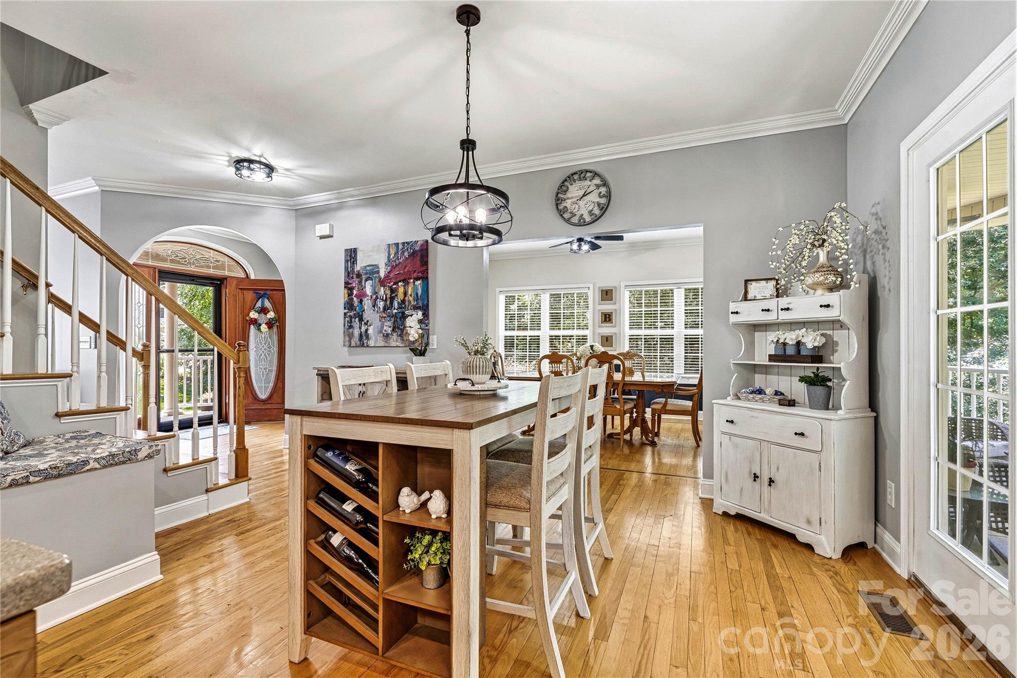 1606 High Ridge Drive Stanley, NC 28164 - Photo 11 of 44 a view of a dining room with furniture window and wooden floor