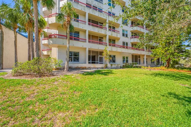 front view of a building with a yard