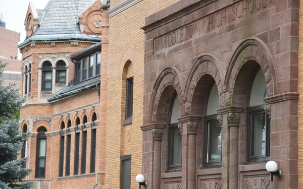 a view of a utility room with multiple dryer