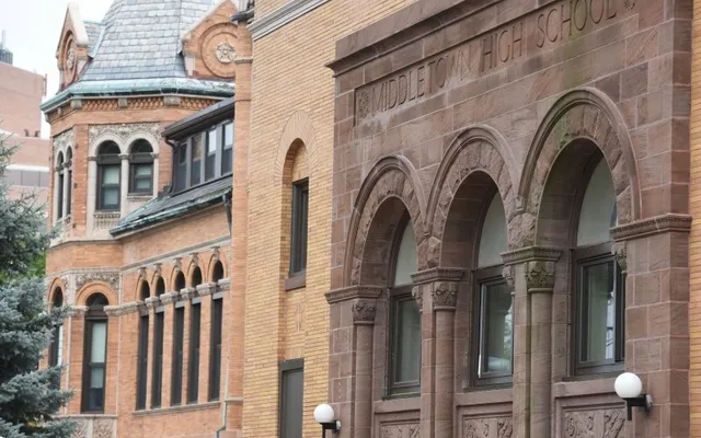 a view of a utility room with multiple dryer