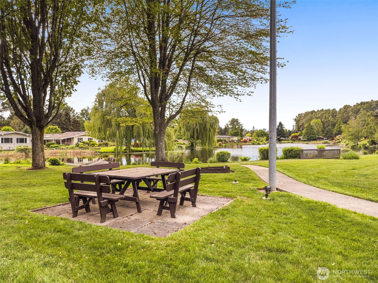 23807 7th Place West Bothell, WA 98021 - Photo 24 of 26 a view of a house with garden and a patio