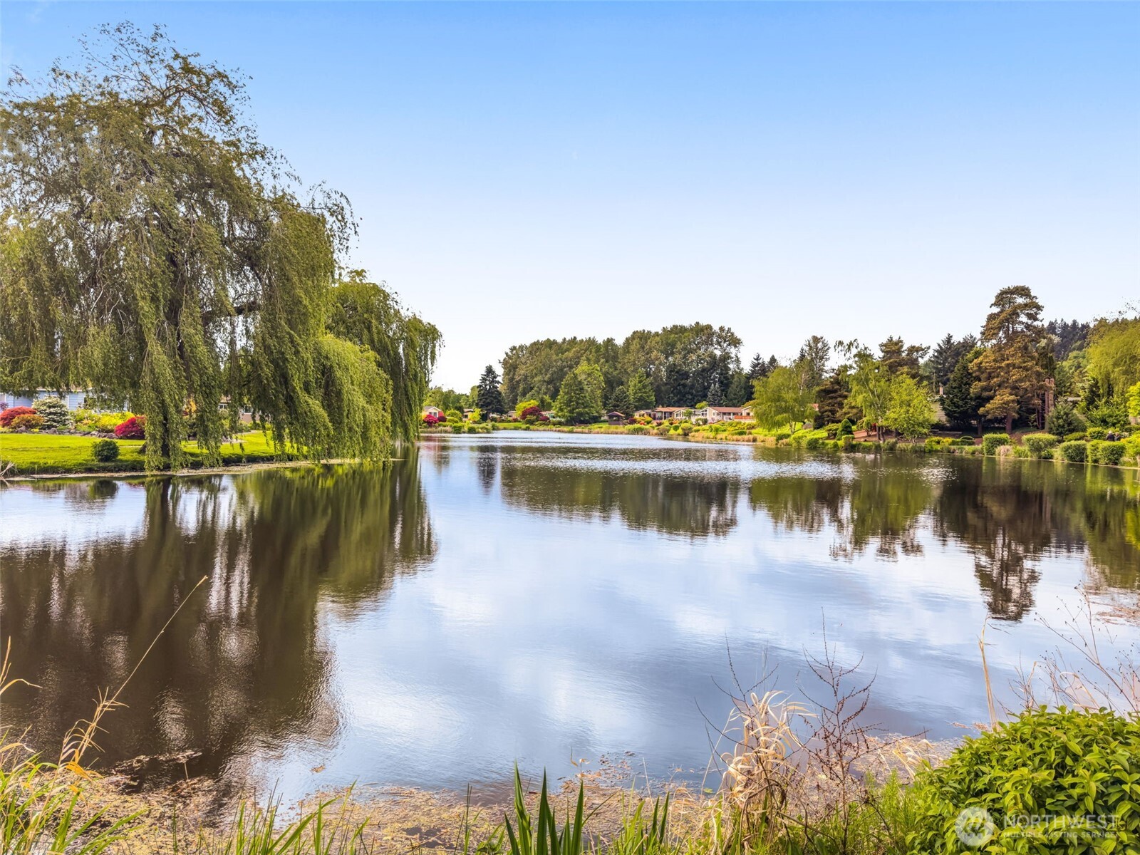 23807 7th Place West Bothell, WA 98021 - Photo 26 of 26 a view of a lake with houses in the back