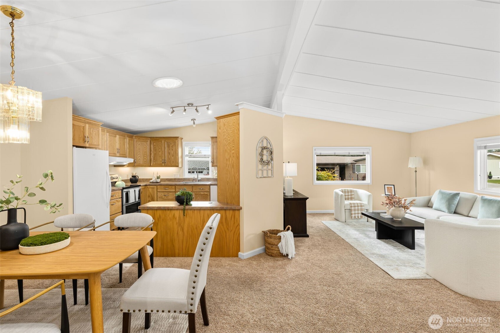 23807 7th Place West Bothell, WA 98021 - Photo 9 of 26 a living room with furniture dining table and a refrigerator