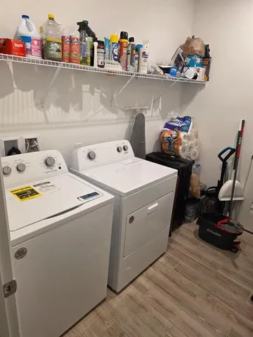 a utility room with dryer and washer