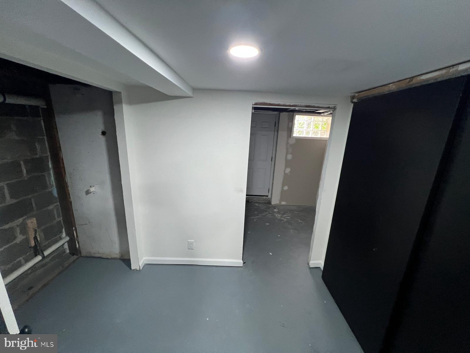 3711 10th Street Baltimore, MD 21225 - Photo 18 of 25 a view of a hallway