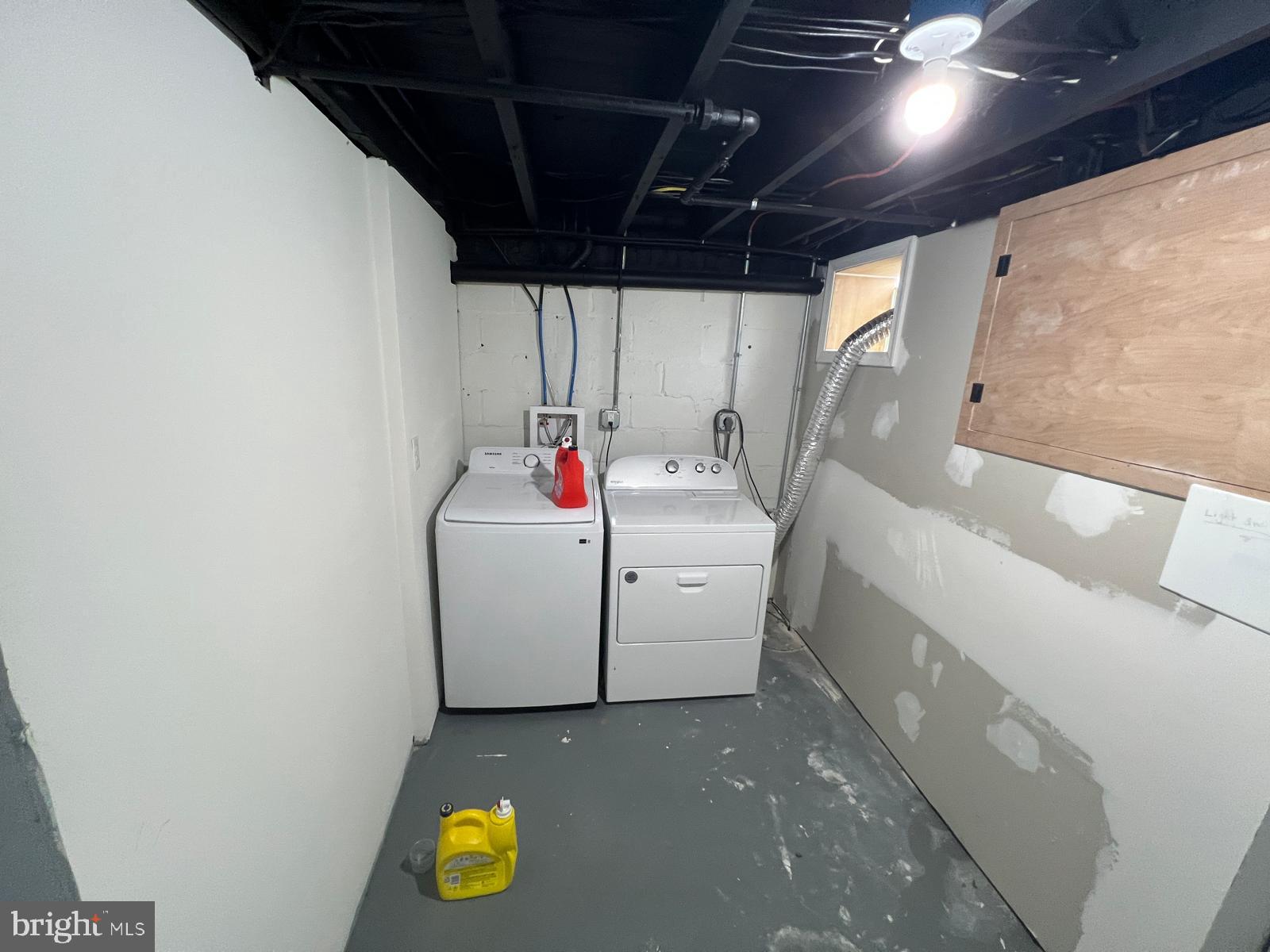 3711 10th Street Baltimore, MD 21225 - Photo 22 of 25 a utility room with dryer and washer