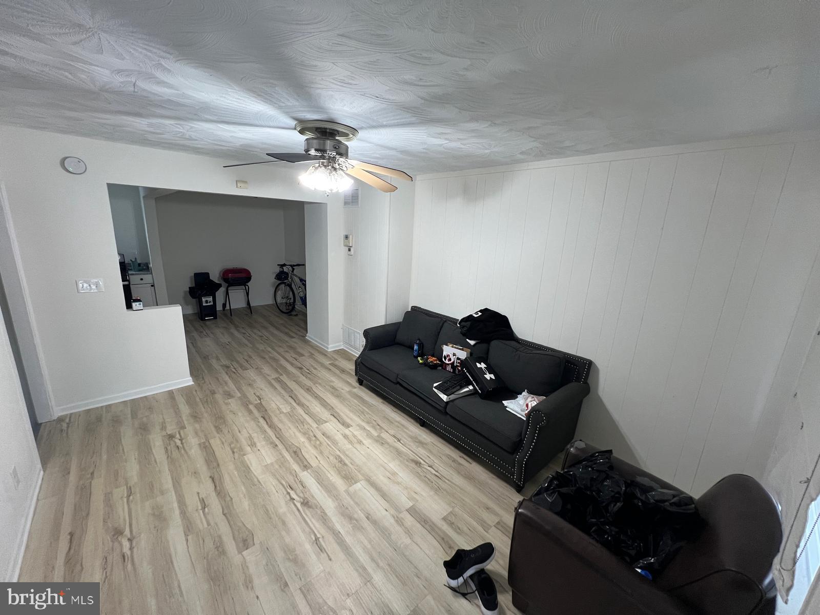 3711 10th Street Baltimore, MD 21225 - Photo 3 of 25 a living room with furniture