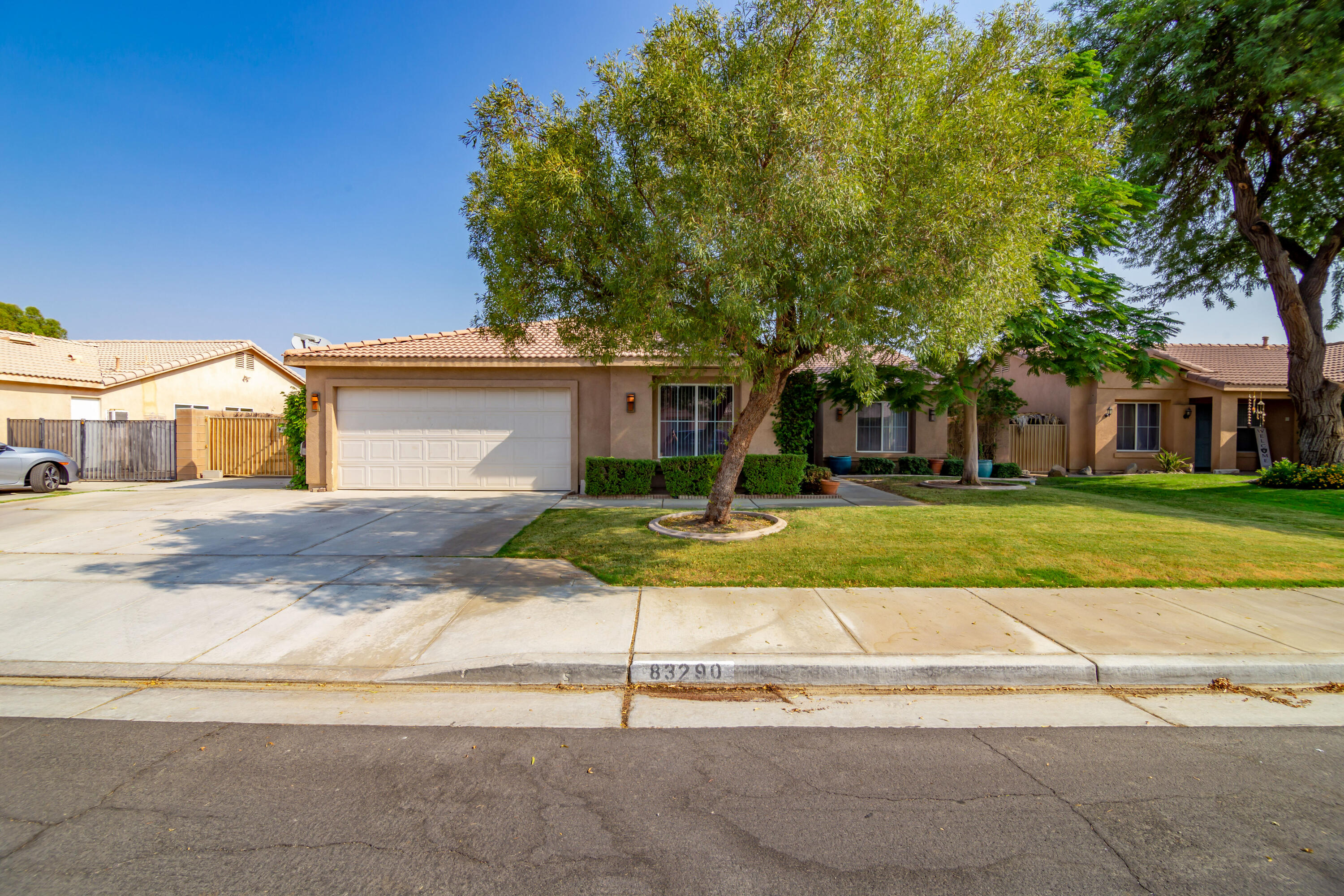 83290 Antigua Drive Indio, CA 92201 - Photo 1 of 31 a view of a house with a yard