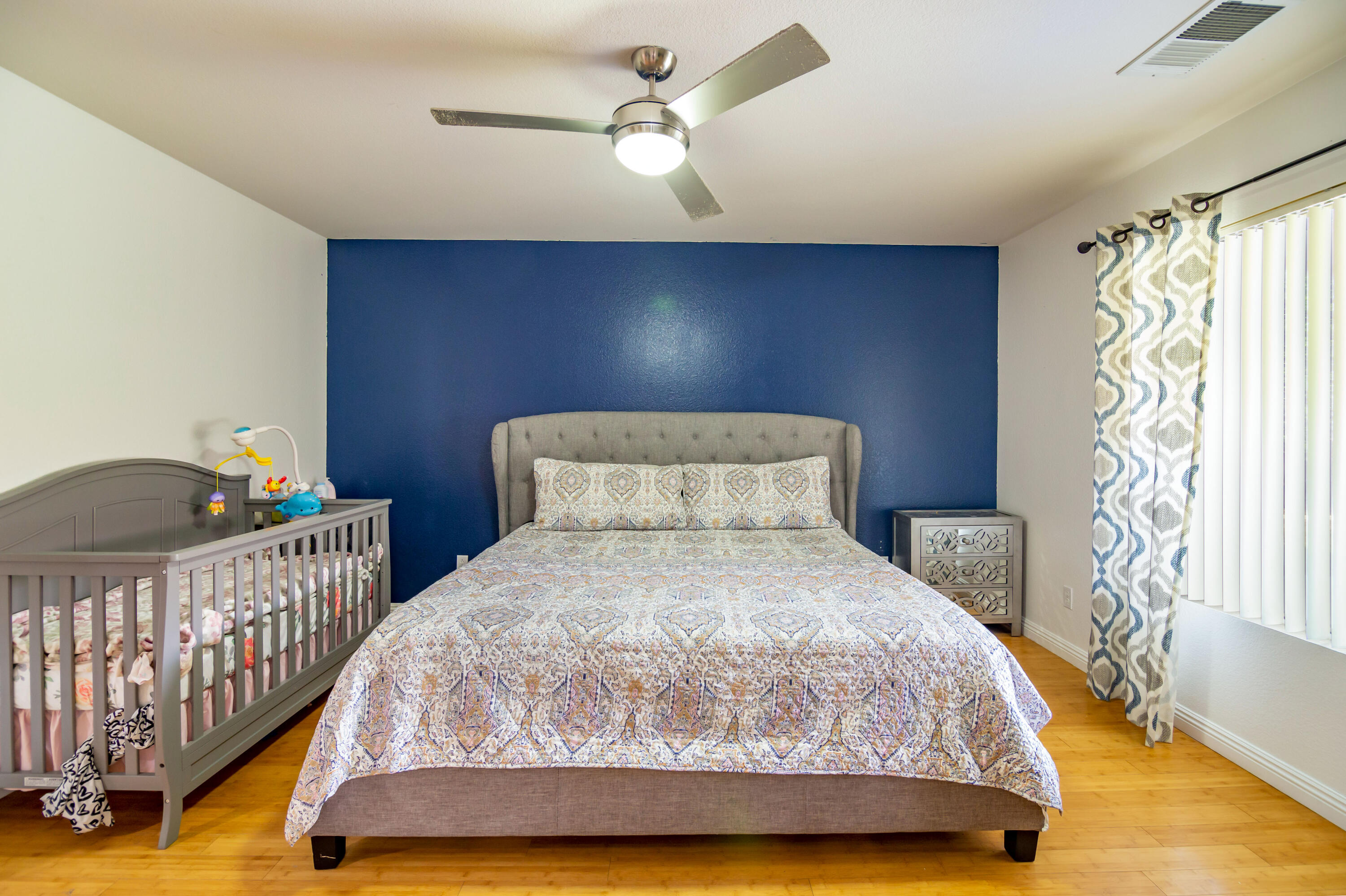 83290 Antigua Drive Indio, CA 92201 - Photo 16 of 31 a bedroom with double bed and a window