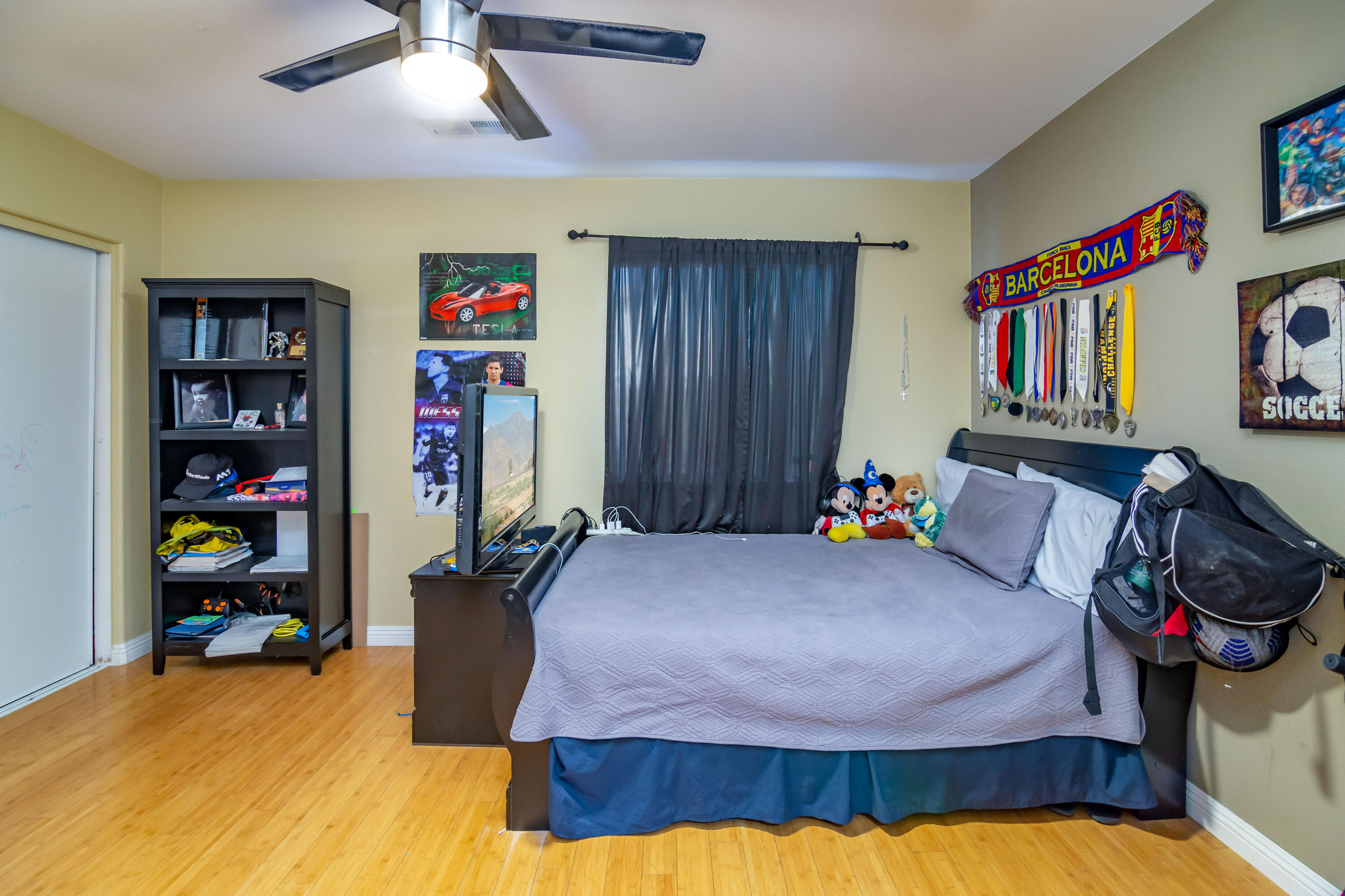 83290 Antigua Drive Indio, CA 92201 - Photo 20 of 31 a bedroom with bed and a book shelf