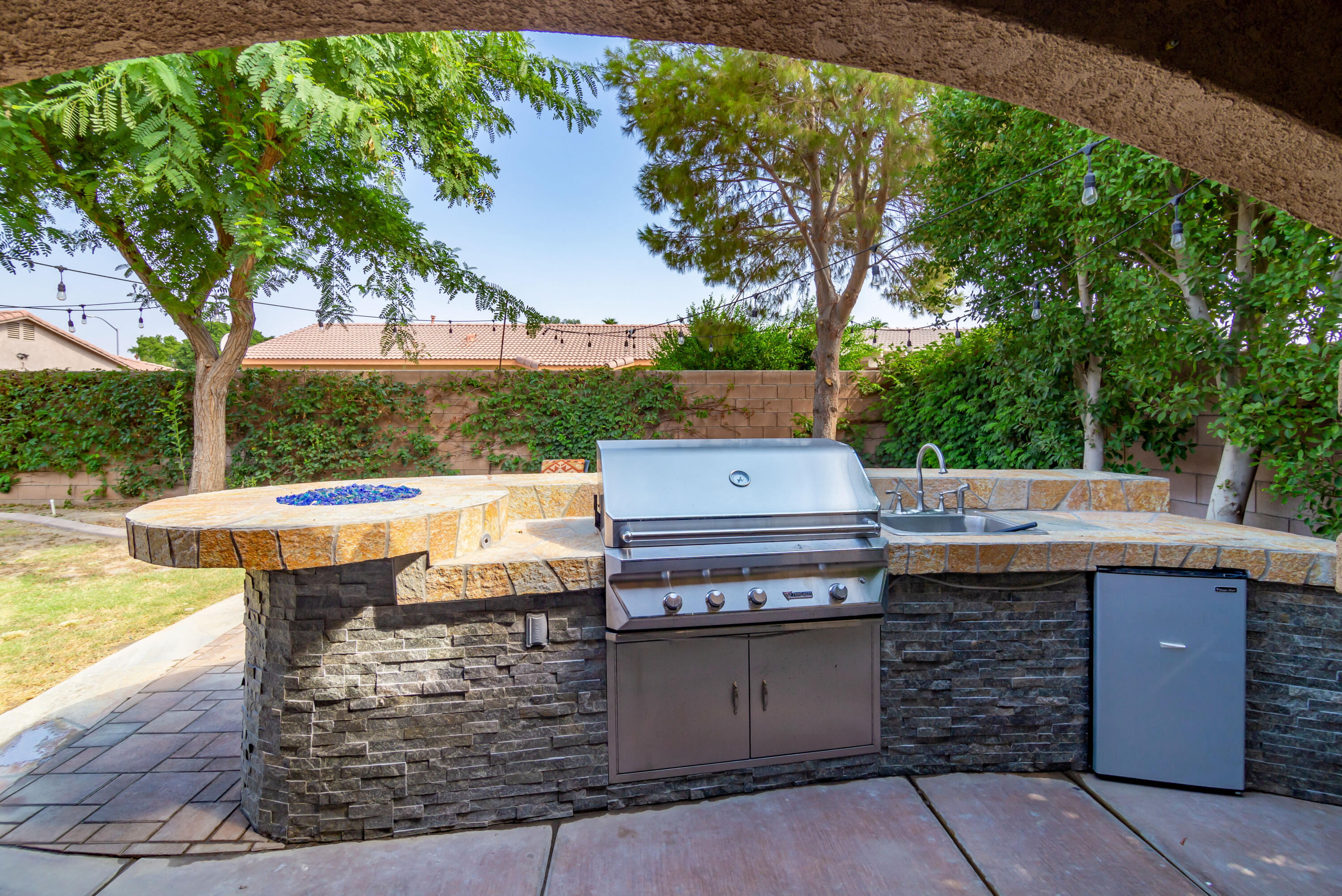 83290 Antigua Drive Indio, CA 92201 - Photo 26 of 31 a view of a swimming pool with a patio