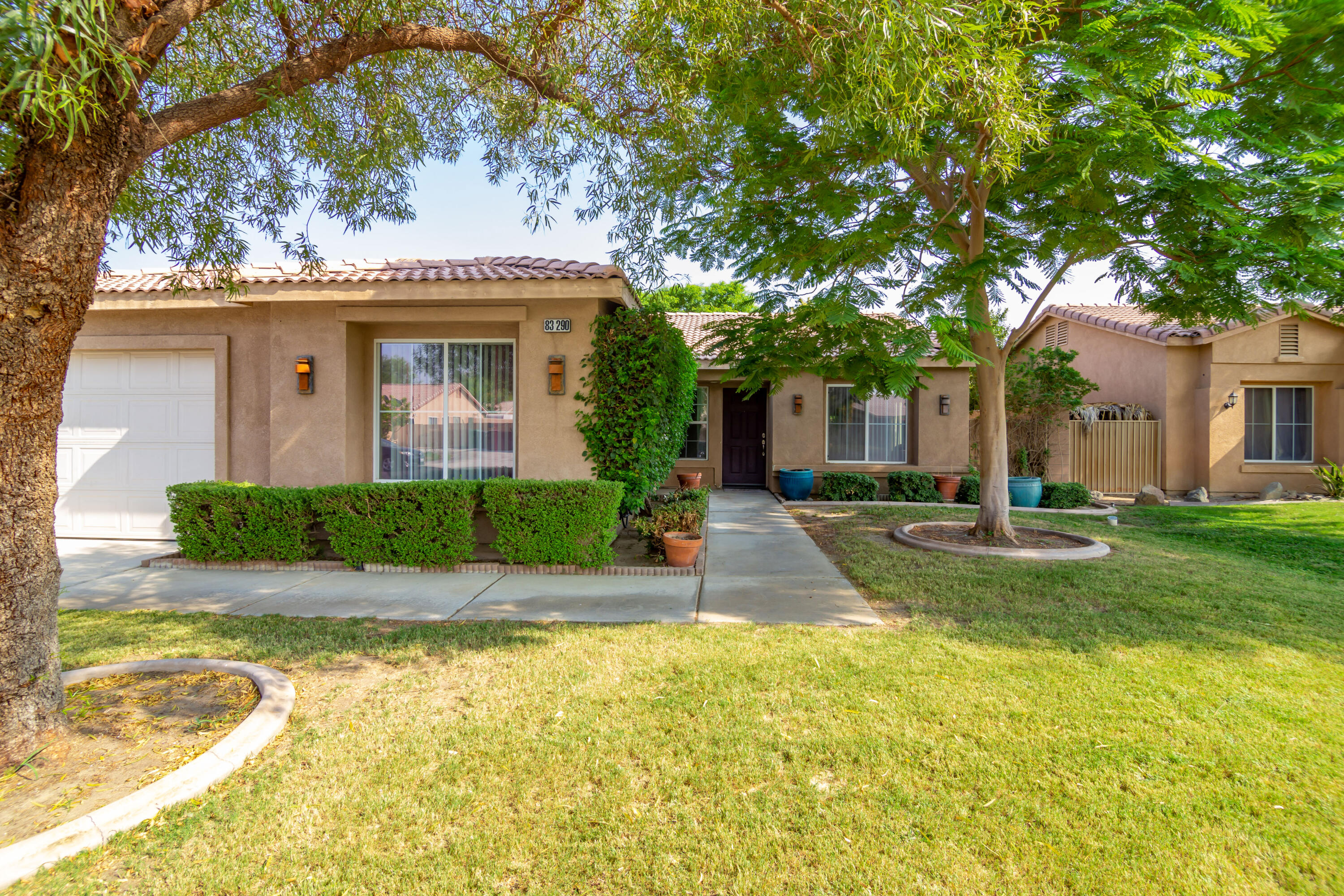 83290 Antigua Drive Indio, CA 92201 - Photo 4 of 31 a view of a house with a swimming pool