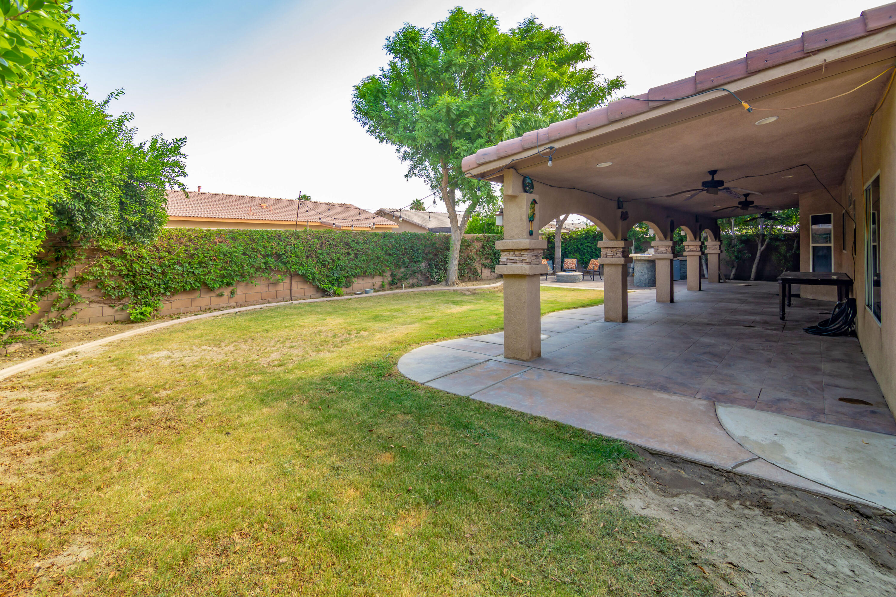 83290 Antigua Drive Indio, CA 92201 - Photo 31 of 31 a view of a backyard with swimming pool